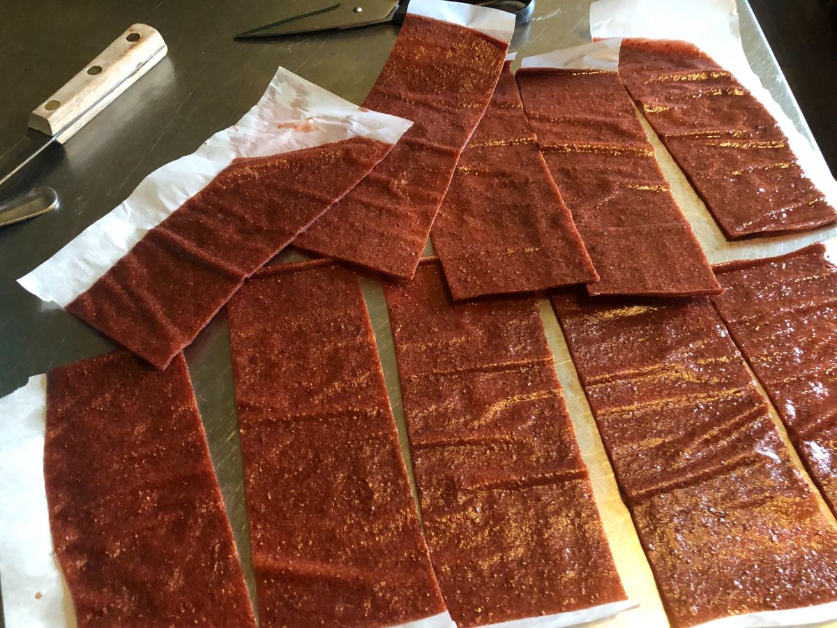 Cut up homemade strawberry fruit leather